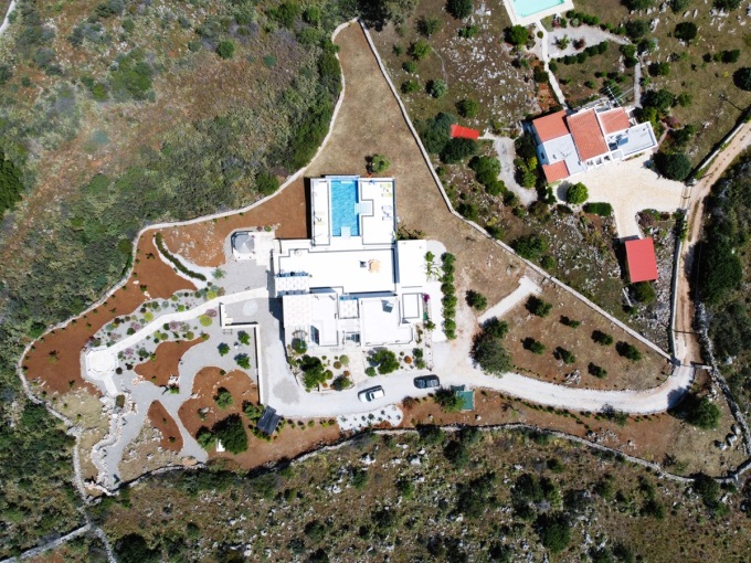 Exquisite Villa with Panoramic Sea Views, Infinity Pool, and Luxurious Features For Sale In Litsarda - 1